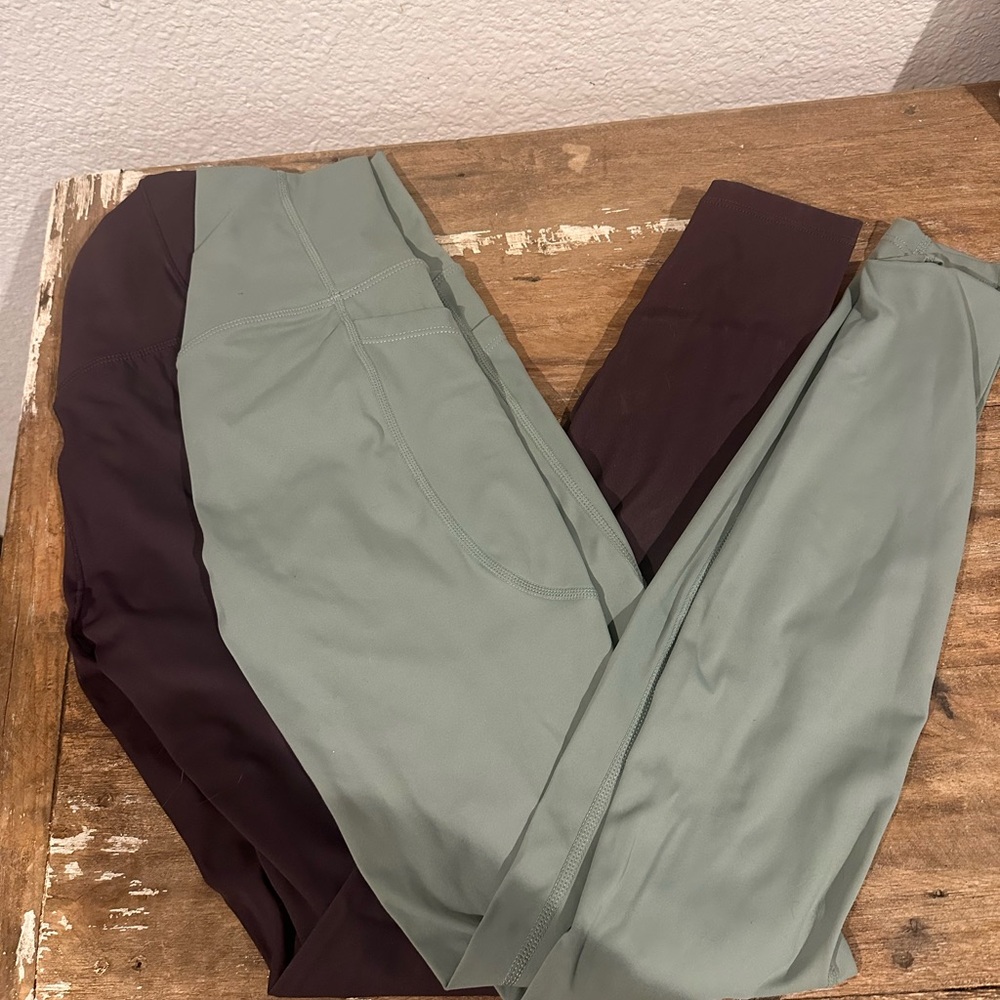 set of 2 Halara cross leggings - light green and dark purple